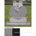 weeping angel tombstone with rose
